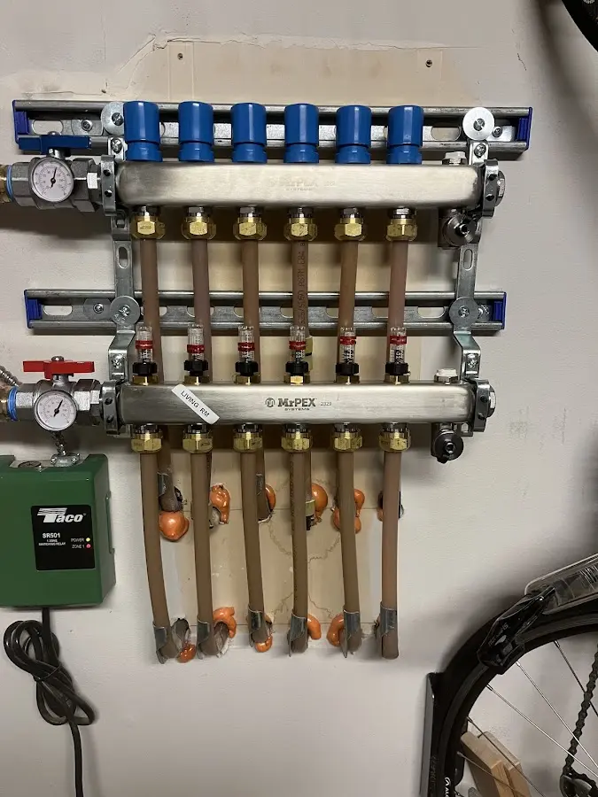 Plumber performing Gas Line Installation at a residential property in Iowa